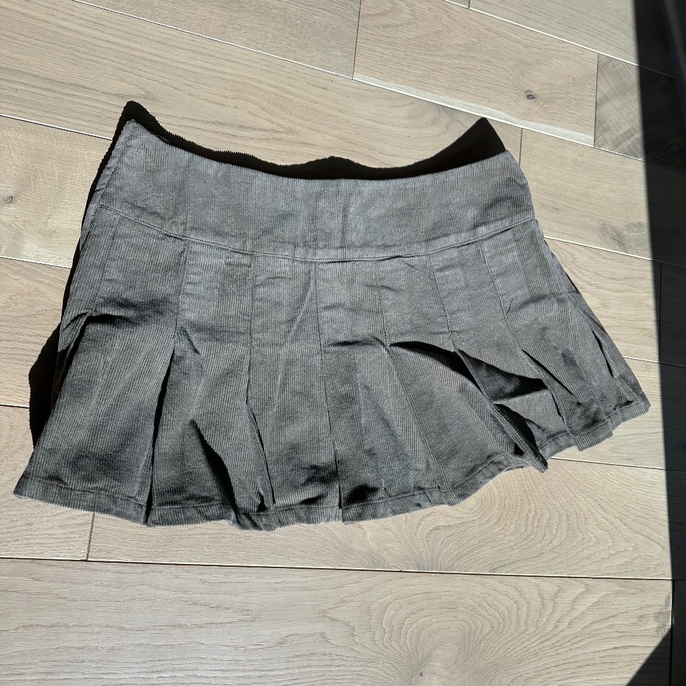 ASOS DESIGN Petite pleated cord mini skirt in biscuit